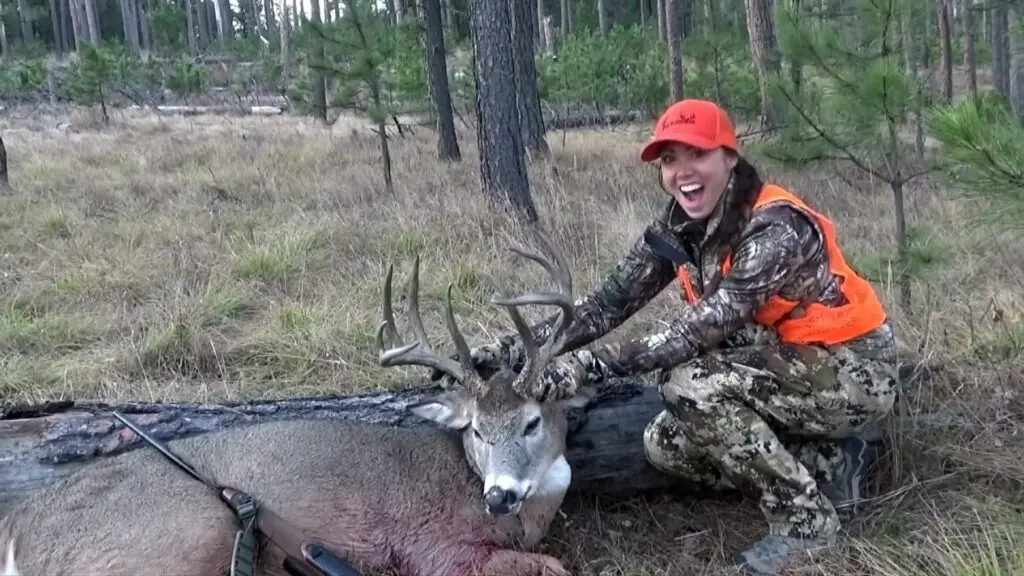 Proud-female-hunter-with-her-new-trouphy-buck